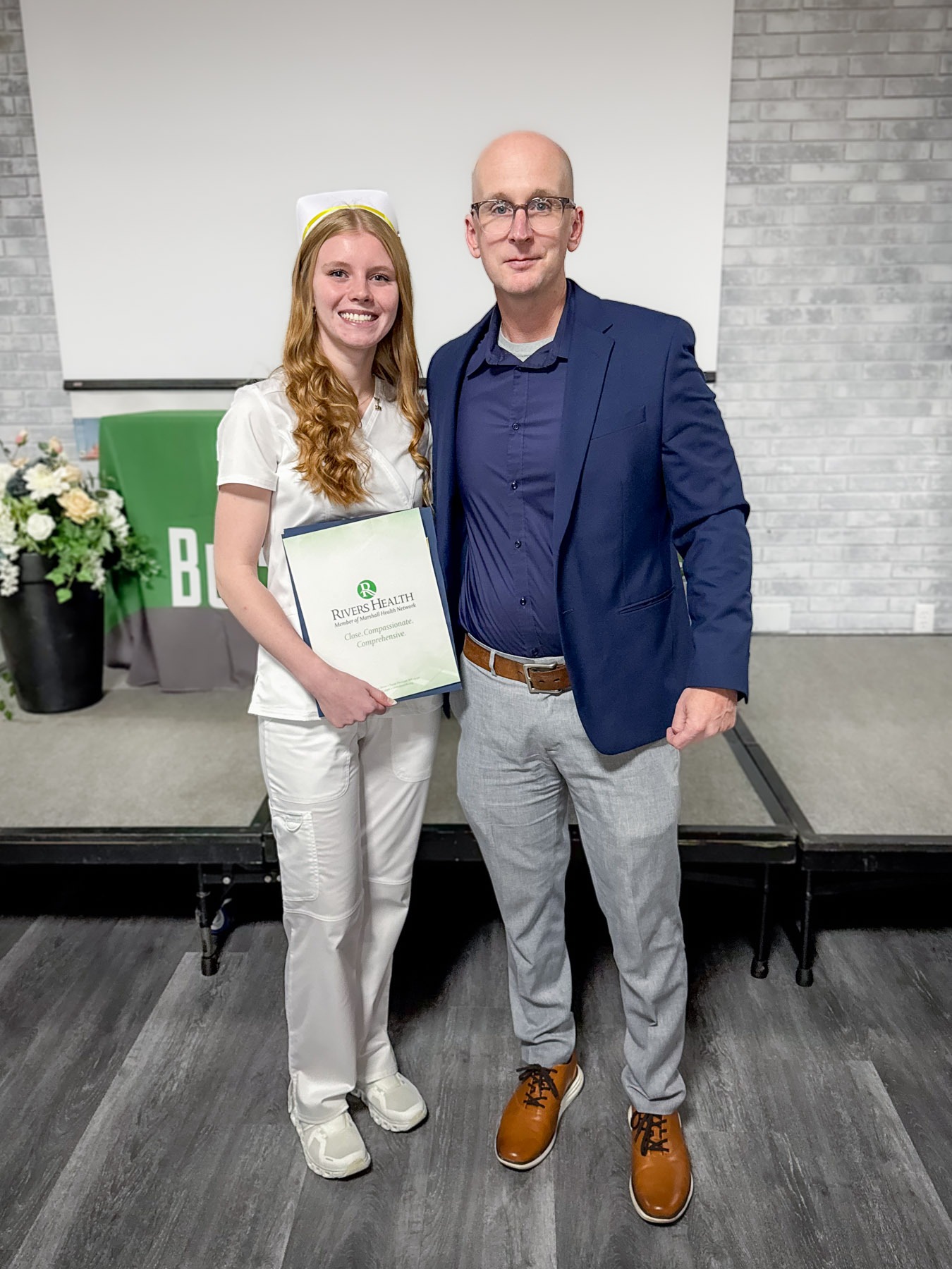 Carlee Manley, Best in Class Performance Award recipient with Jarod Zelaska, Executive Director of Human Resources at Rivers Health